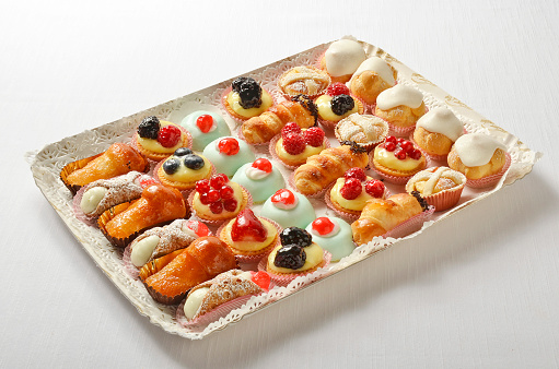 Various desserts in candy bar food buffet during hotel brunch. Self service in hotel restaurant.