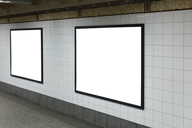 Two white blank billboards in the tunnel. stock photo