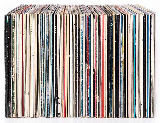 istock Row of vinyl records, isolated on white 495698215