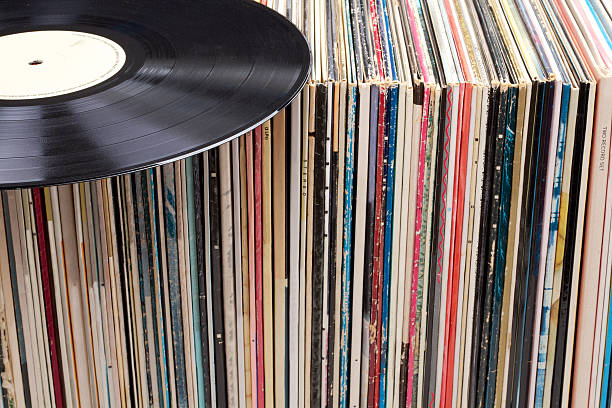 istock Records in a row, one record located on top 495698227