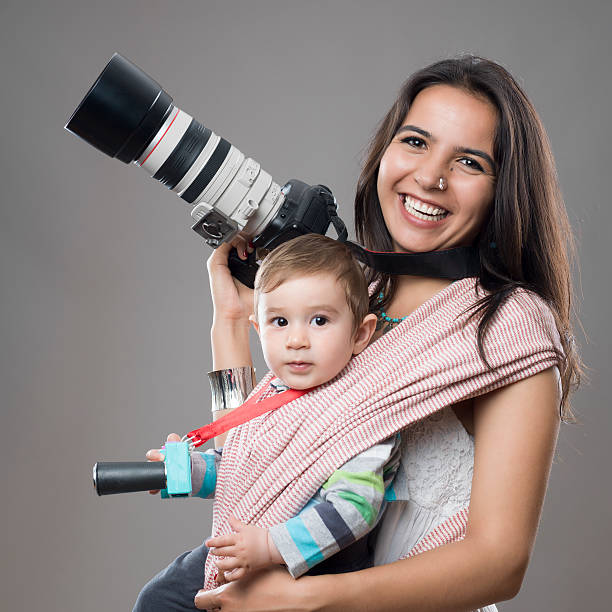 istock Photographer mother and her son ready for shooting 495701087