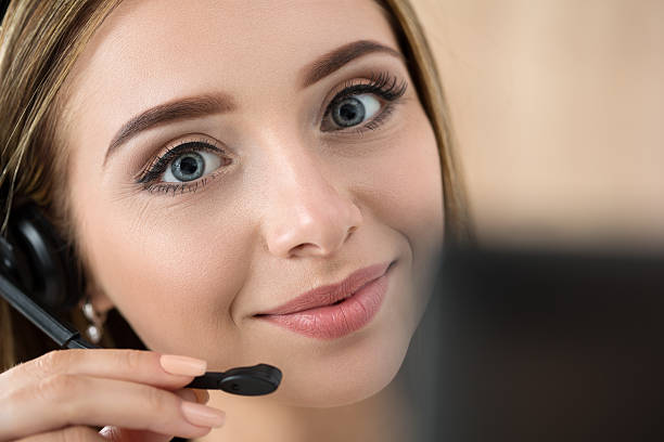 istock Portrait of beautiful call center operator at work 495701922