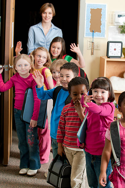 istock Children Lined up for Recess 495702120