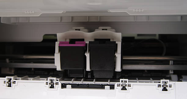istock cartridges with colored and black ink in printer 495703060