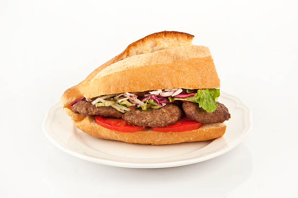 Delicious Turkish Kofte Sandwich (meatballs) isolated white background stock photo