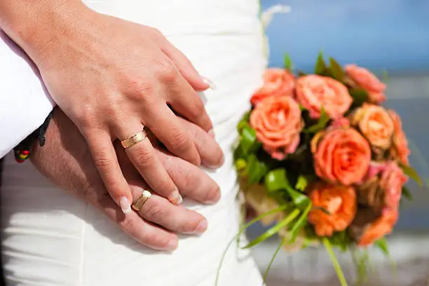 Bride,groom and wedding flowers