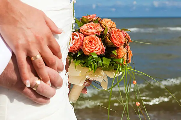 Bride,groom and wedding flowers