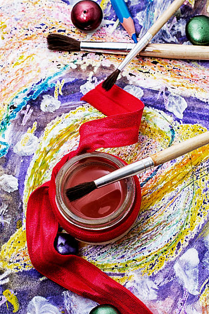 istock oil paint four colors and old brush 495716699