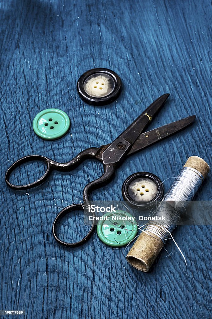 buttons and zipper different buttons and zipper on the background of sewing tool Art Stock Photo