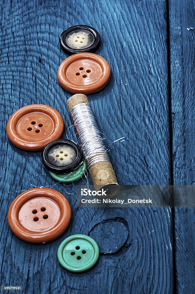 buttons and zipper different buttons and zipper on the background of sewing tool Art Stock Photo