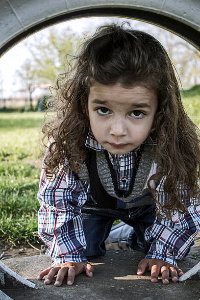 istock Little boy playing at playground 495721647