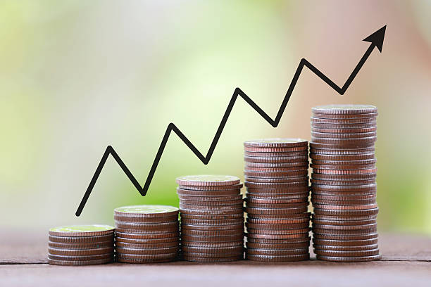 istock silver coin stack and arrow line in business growth concept. 495725604
