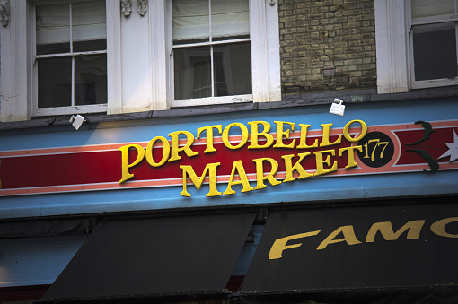 portobello market signboard in notting hill
