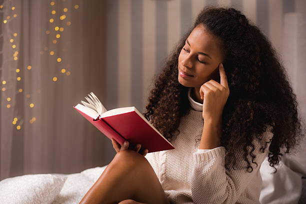 istock Woman with her favorite book 495728292
