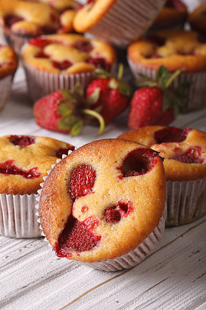 istock homemade strawberry muffin close-up vertical 495729026