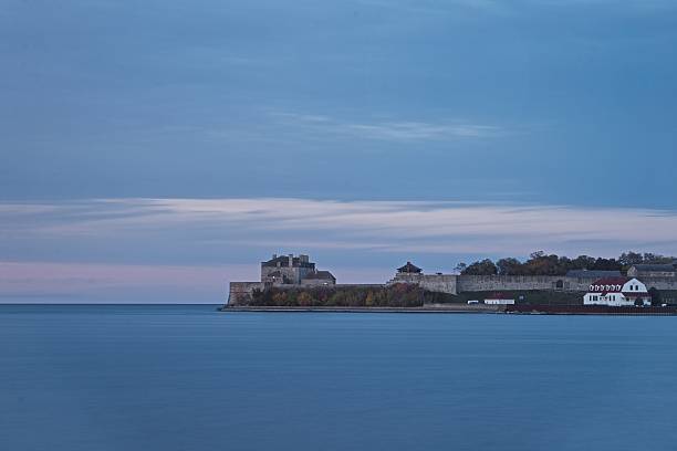 Fort Niagara, late auntumn evening, Niagara on the Lake Fort Niagara, on the north bank of the Niagara River, seen from Niagara on the Lake, Ontario, Canada in the late autumn evening light. youngstown stock pictures, royalty-free photos & images