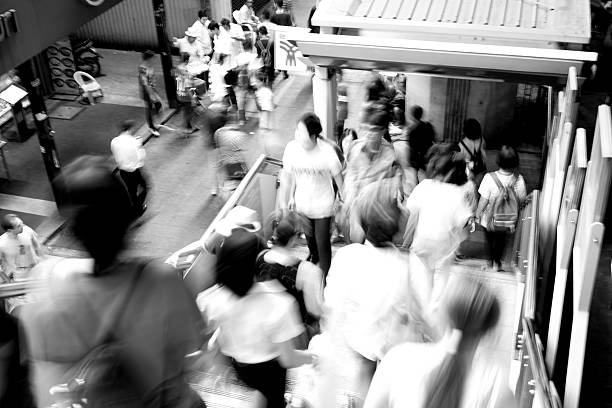 istock Moving blur people walking - black and white effect 495730258