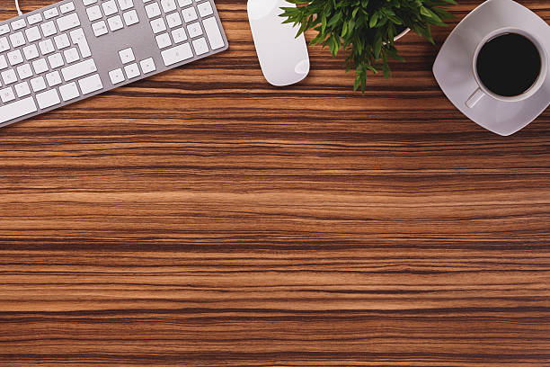 istock Top of desk with empty space and office equipment. 495730846