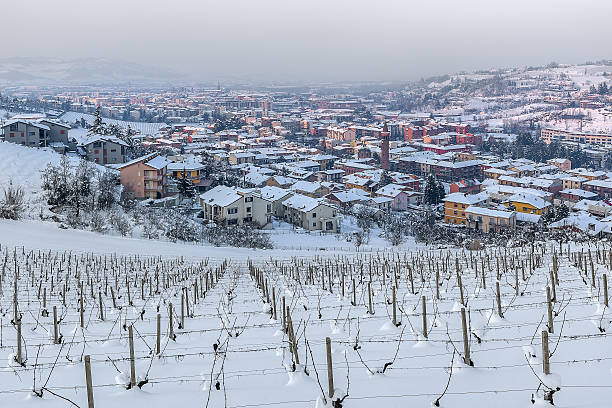 istock Town of Alba among wintry hills. 495730912
