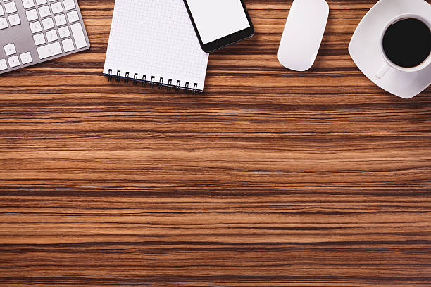 istock Top of desk with empty space and office equipment. 495732130