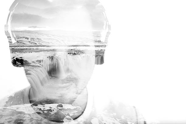istock Young man with headphones and waterfall, double exposure 495732142