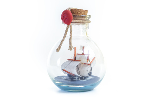 Ship in a Bottle. Clean and isolated on white background.