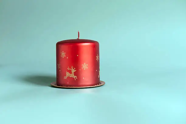 Christmas candle with symbols on it