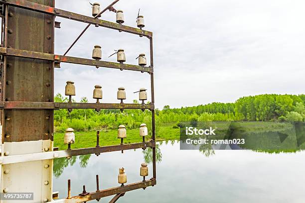 Foto de Insulator Em Um Poste De Luz e mais fotos de stock de Abstrato - Abstrato, Antigo, Arame