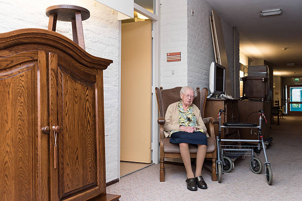 old woman suffers move into retirement home