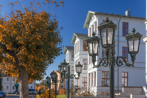 Row an old streetlights in Ahlbeck, small tourist resort located at the Baltic Sea in Germany