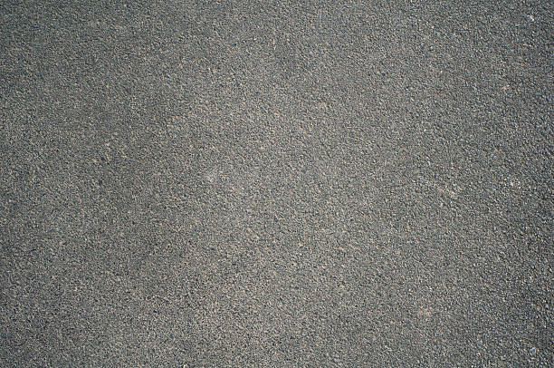 Asphalt Photo of dark asphalted surface background tarmac stock pictures, royalty-free photos & images