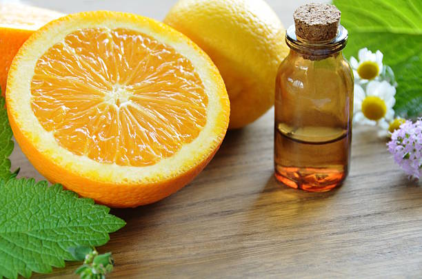 istock essential oils with fruits and herbs 495739029