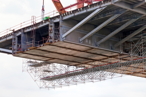 steel bridge construction with scaffolding