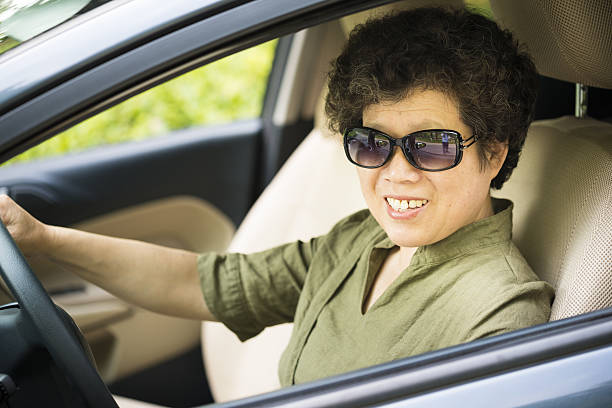 istock aisan woman driving 495744649
