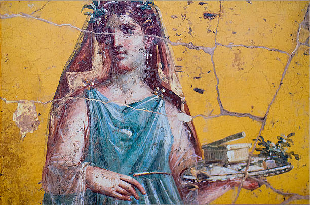 Roman Fresco of woman in Pompeii detail of the fresco in Pompeii with winged griffin on a red background Pompeian fresco stock pictures, royalty-free photos & images