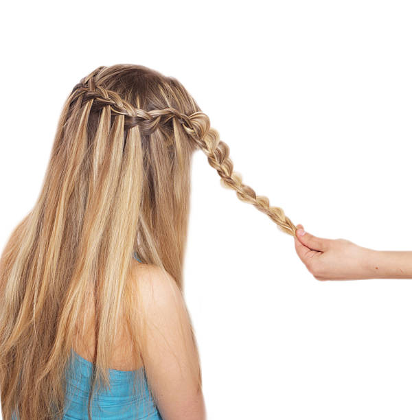 istock Braiding. French waterfall with flower 495747085
