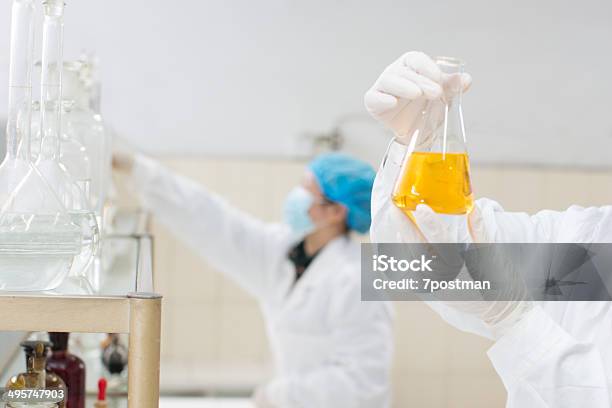 Lab Experiment Stock Photo - Download Image Now - Analyzing, Bacterium, Beaker