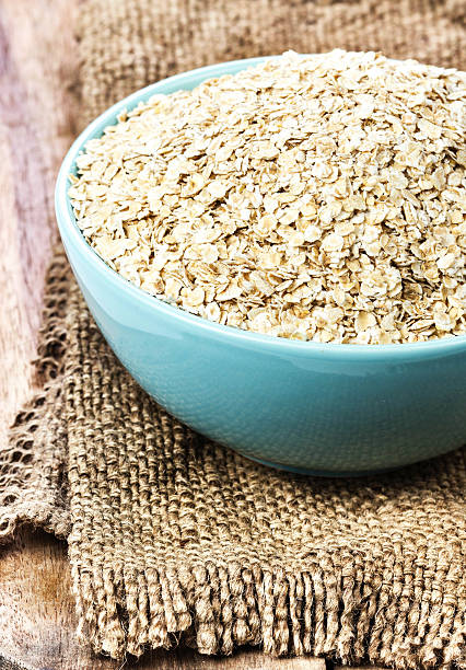 istock Oat flakes for Breakfast isolated on white background 495748393