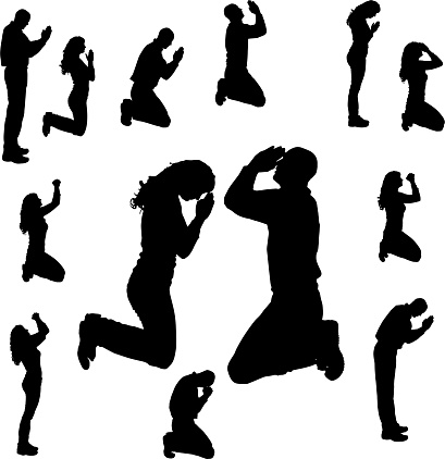 Vector silhouette of people who pray on a white background.