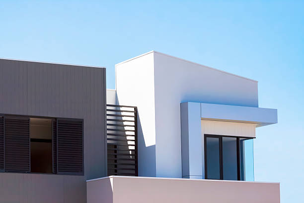 Closeup modern new house against blue sky, copy space