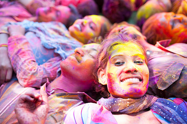 istock Friends relaxing, Holi Festival 495750075