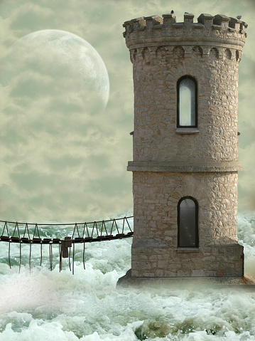 tower in the ocean with bridge.