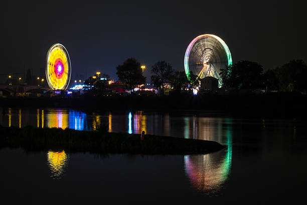 istock Colorful Ferris Wheels at Night 495750392