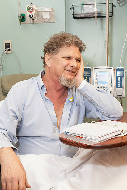 istock Smiling Man Getting Chemotherapy Treatment 495750595