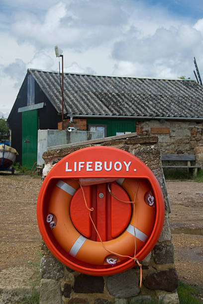 istock Lifebuoy against boatyard background 495750861
