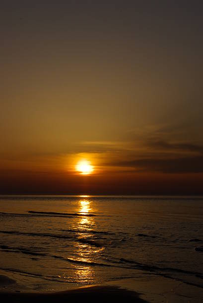 istock Beautiful orange blue sunset at Baltic sea 495751329