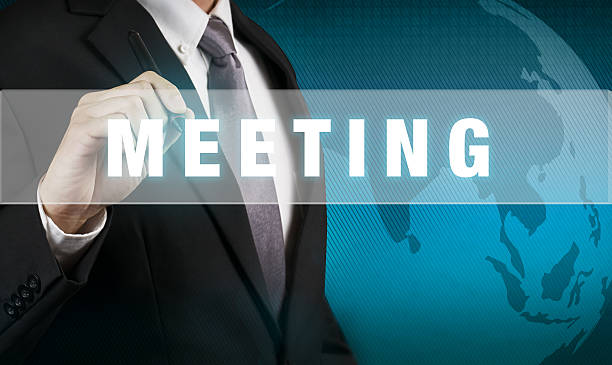 istock Businessman with MEETING WORD 495756330