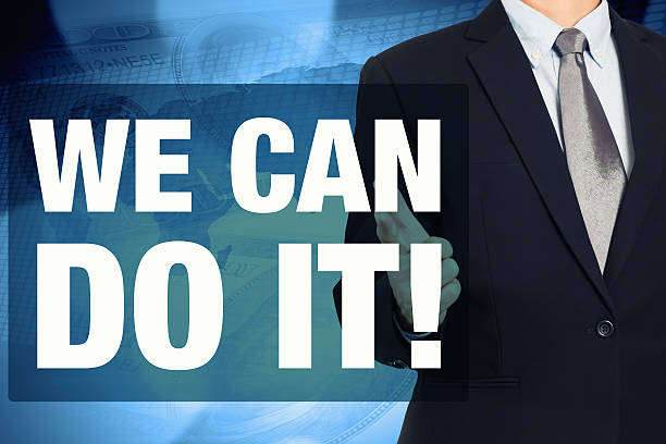 istock Businessman with WE CAN DO IT Word For Financial 495756910