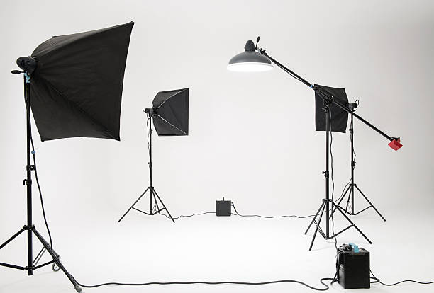 Professional photo studio Professional photo studio with flash lights, stands, camera and background equipments behind the scenes photos stock pictures, royalty-free photos & images