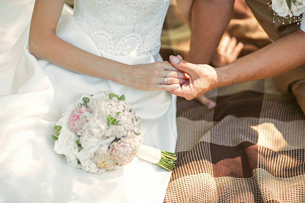 istock couple holding hands outdoors 495757072